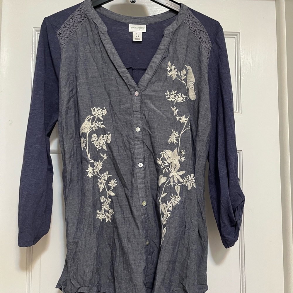 Motherhood Maternity Embroidered lightweight denim and knit blouse.